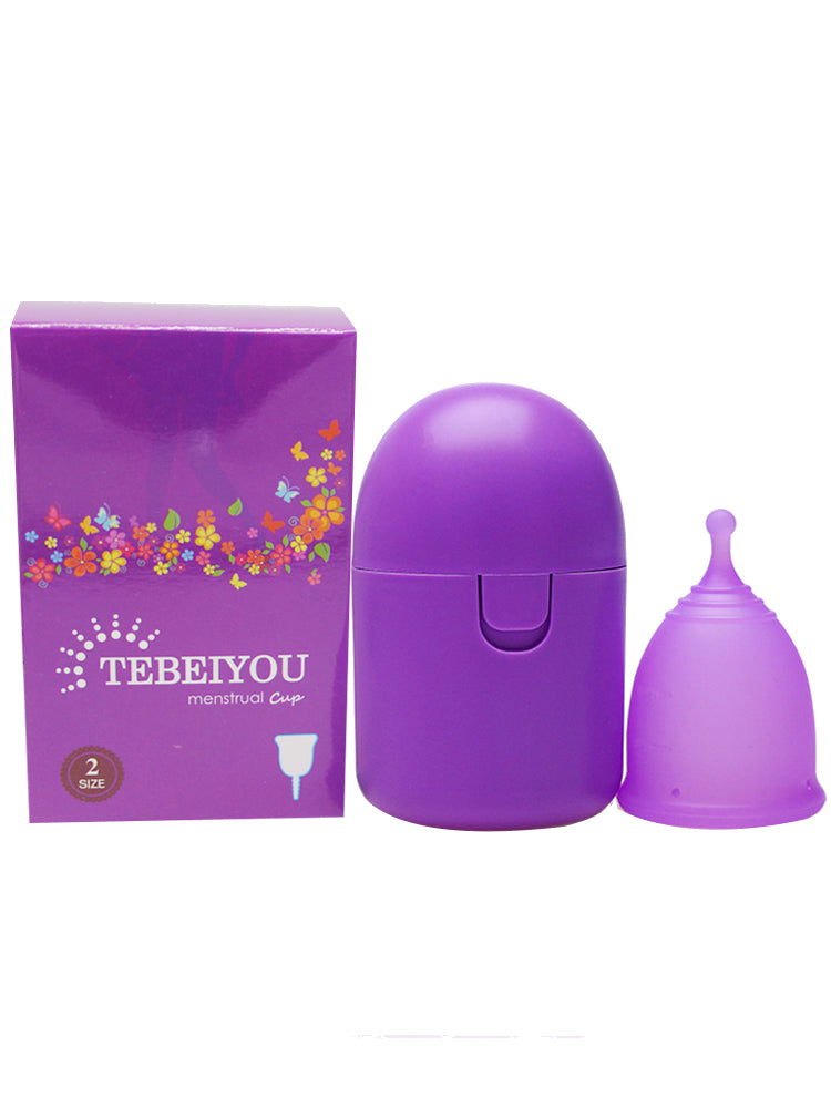Purple menstrual cup and packaging with 'Tebel vou' branding on a white background
